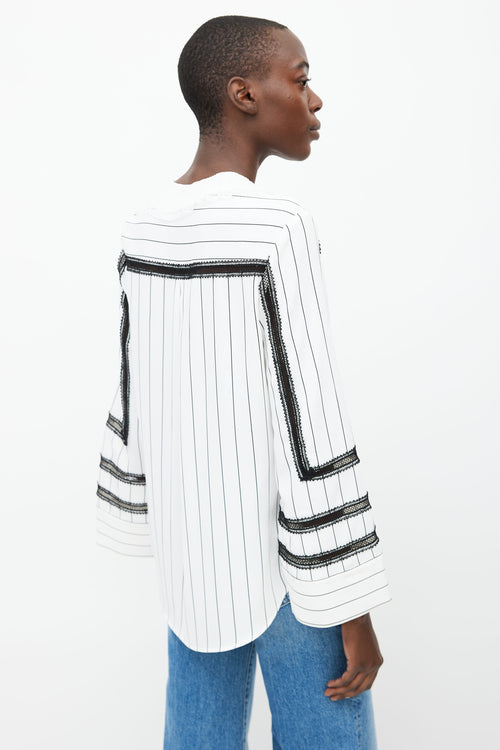 Self Portrait White 
Black Pinstripe Ruffle Blouse