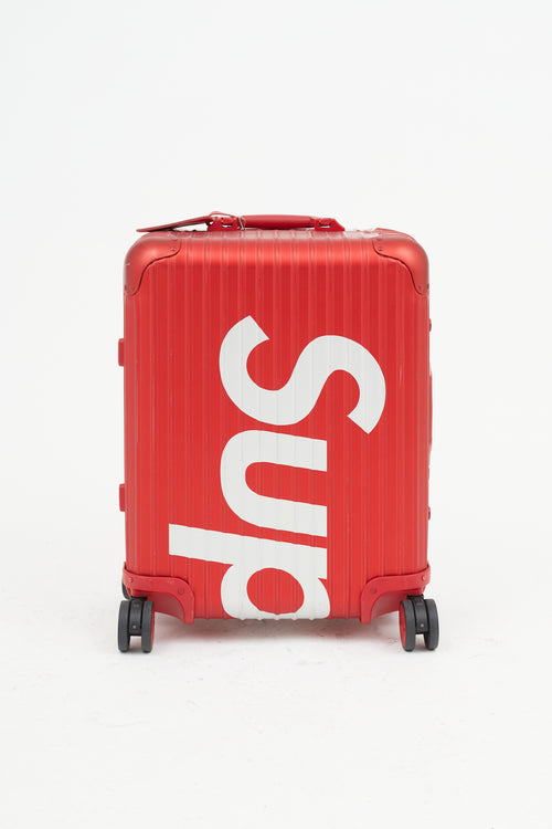 Rimowa x Supreme 45L Red 
White Logo Hard Case Topas Luggage