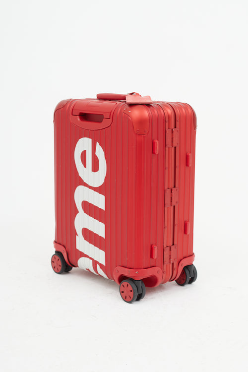 Rimowa x Supreme 45L Red 
White Logo Hard Case Topas Luggage