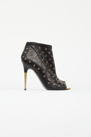 Tom Ford Black 
Gold-Tone Grommet High Heel Boot