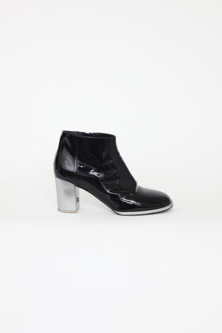 Chanel Black 
Silver Ankle Boots