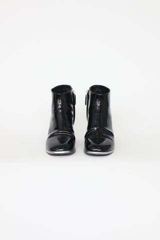 Chanel Black 
Silver Ankle Boots