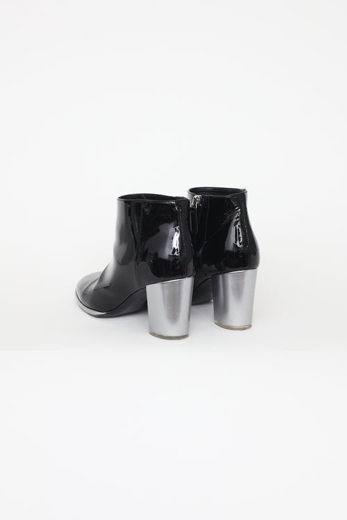 Chanel Black 
Silver Ankle Boots