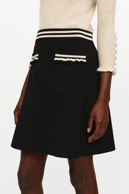 Sandro Black 
Beige Knit Midi Skirt