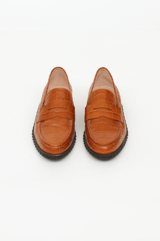 Tod
s Brown Embossed Penny Loafers